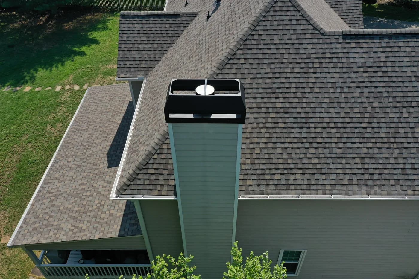 Aerial view of a finished chimney with a custom pan and shroud on a North Georgia home