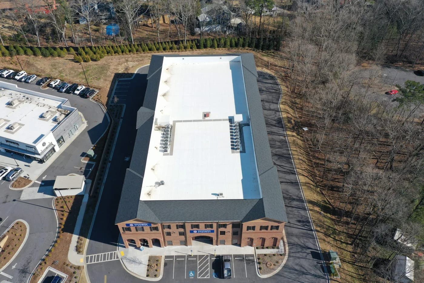 Drone view of a large commercial low-slope roof installed by Platinum Roofing in Atlanta