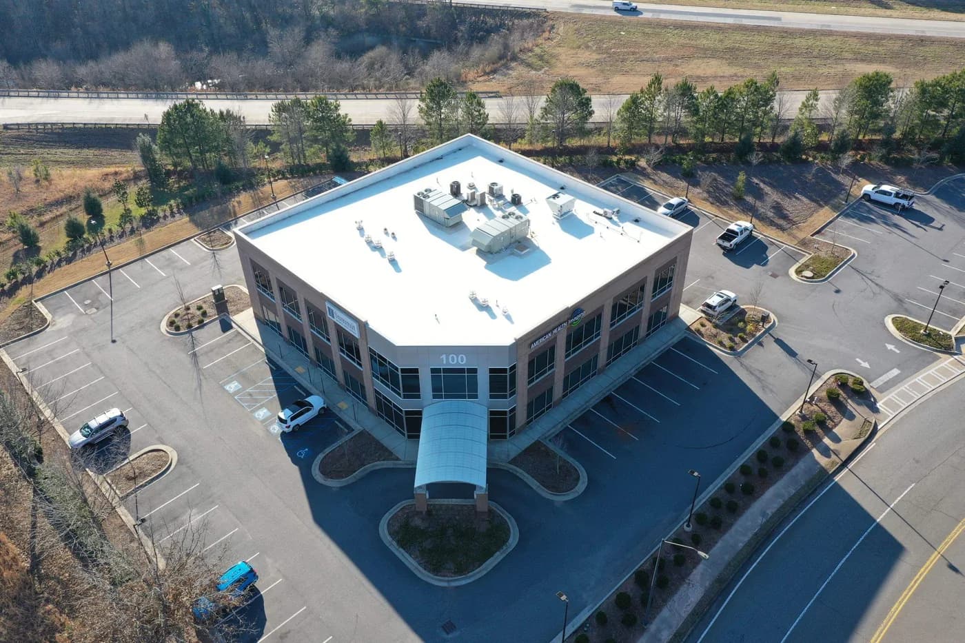 Aerial of a reflective commercial roof on a North Atlanta office building