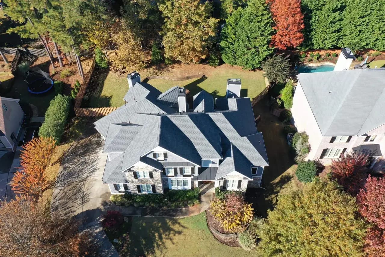 New dark asphalt shingle roof on a two-story North Atlanta home