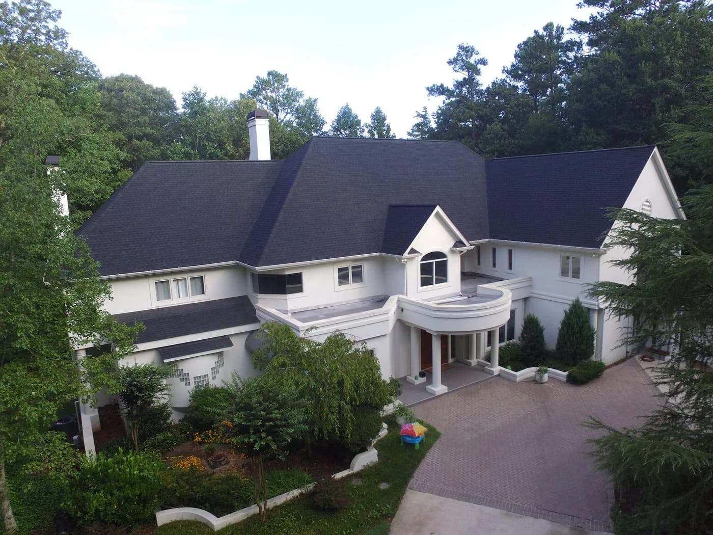 New architectural shingle roof on a North Atlanta two-story home by Platinum Roofing