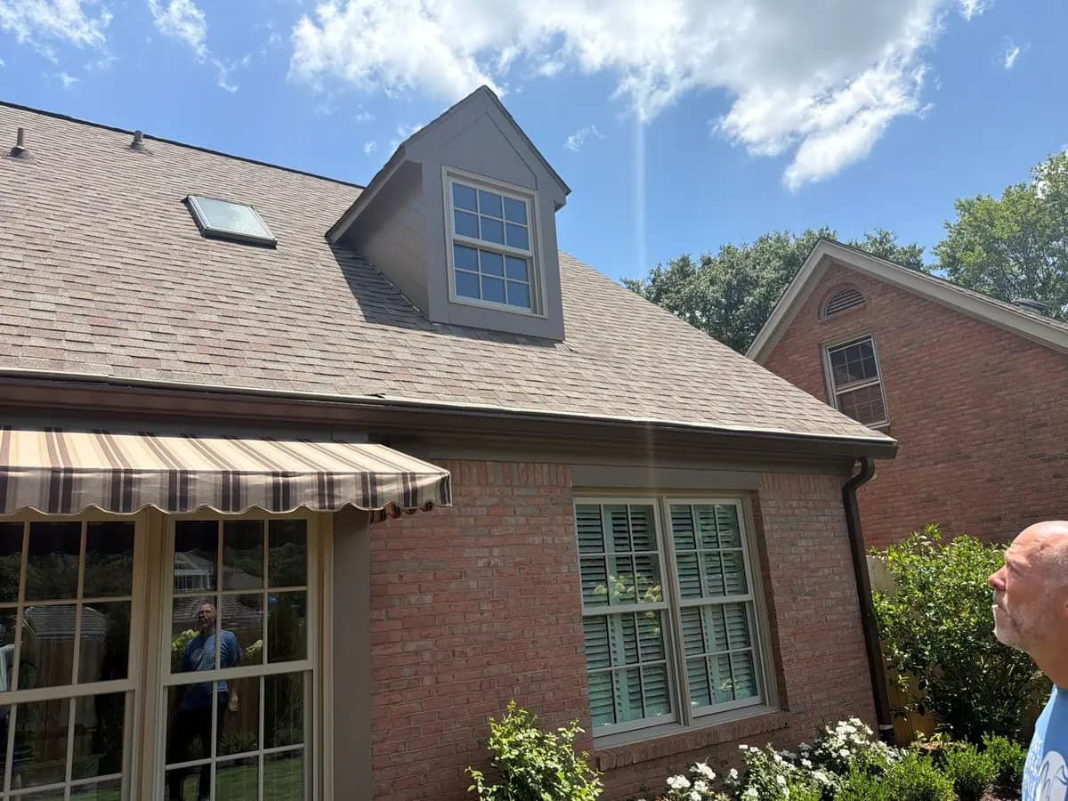 Roof and dormer on a brick home in Roswell, GA
