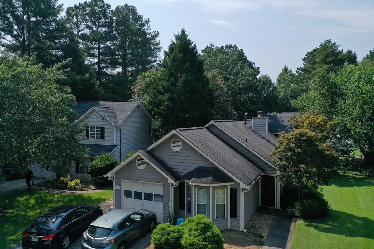 Aerial view of a finished roof on a Marietta, GA home