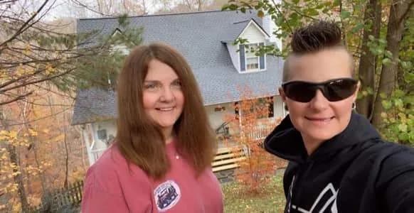 Satisfied homeowners after a Platinum Roofing roof replacement