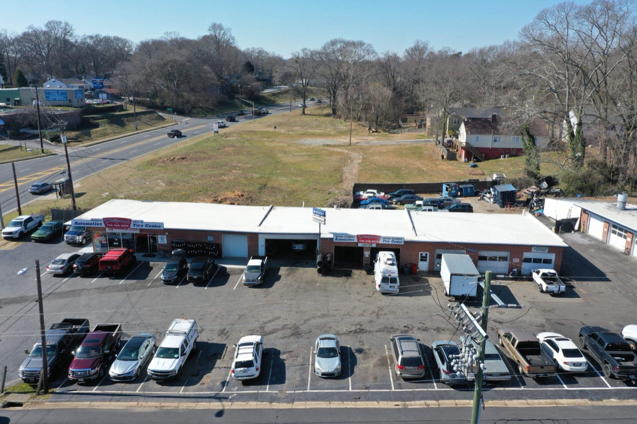 A low-slope commercial roof on a strip center in metro Atlanta