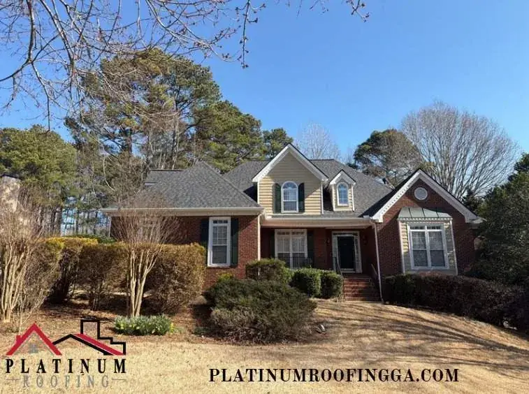 A North Georgia brick home with a new architectural shingle roof, the kind of sound deck a solar array should sit on, installed by Platinum Roofing