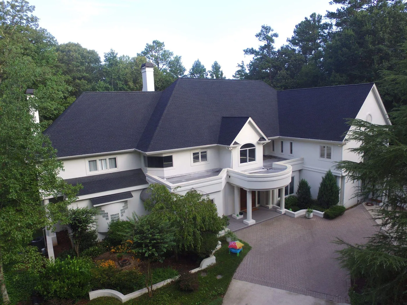 A completed residential roof replacement on a large North Georgia home by Platinum Roofing